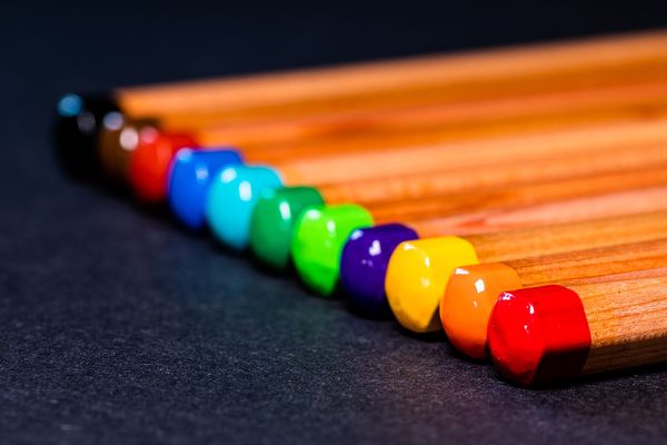 A neat row of coloured pencils